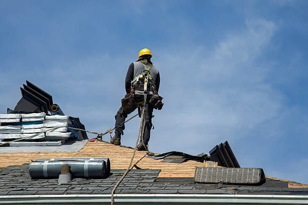Professional Roofing technician working in Pembroke, MA